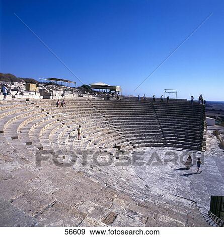 Stock Photo - Tourists at old ruins of amphitheatre, Kourion, Cyprus . Fotosearch