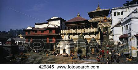 Stock Photography - Tourists at temple, Verbrennungs Platz, Pashupatinath Temple, Kathmandu, Nepal . Fotosearch