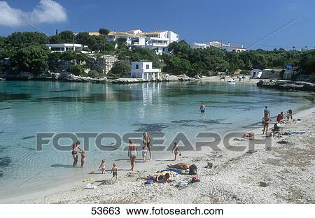 Tourists on beach, Minorca, Balearic Islands, Spain View Large Photo Image Stock Image - Tourists on beach, Minorca, Balearic Islands, Spain . Fotosearch