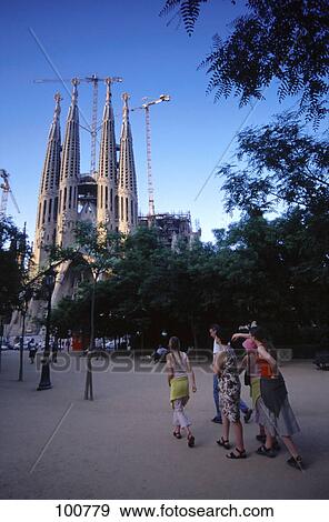 Stock Photo - Tourists walking towards cathedral, Sagrada Familia, Barcelona, Catalonia, Spain . Fotosearch