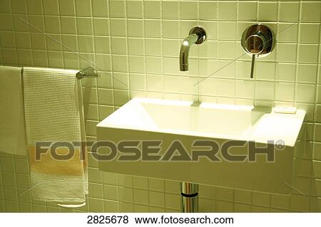 Towel rail and washbasin in bathroom View Large Photo Image Stock Photo - Towel rail and washbasin in bathroom . Fotosearch