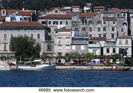 Stock Photography - Town at waterfront, Krka River, Sibenik, Dalmatia, Croatia . Fotosearch