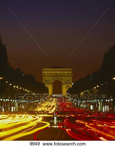 Stock Photo - Triumphal arch lit up at night, Arc De Triomphe, Paris, Ile-de-France, France . Fotosearch