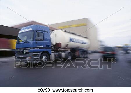 Truck in motion on road View Large Photo Image Stock Image - Truck in motion on road . Fotosearch