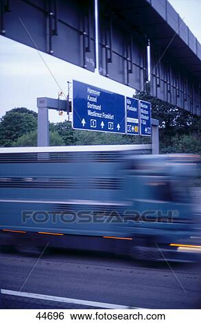 Truck moving on road, Frankfurt, Germany, Europe View Large Photo Image Stock Photograph - Truck moving on road, Frankfurt, Germany, Europe . Fotosearch