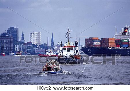 Tug boat in river, Elbe River, Hamburg, Germany View Large Photo Image Stock Image - Tug boat in river, Elbe River, Hamburg, Germany . Fotosearch