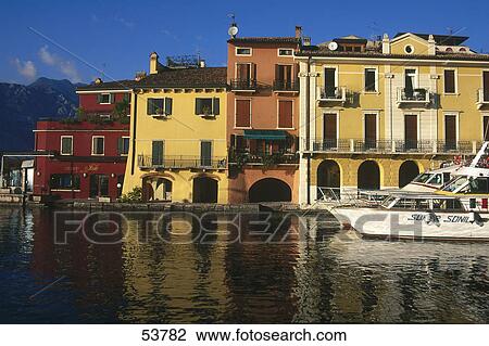 Stock Image - Two boats in harbor, Lake Garda, Veneto, Italy . Fotosearch