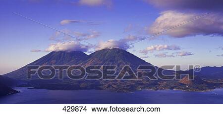 Picture - Volcanoes at lakeside, Atitlan Lake, Guatemala . Fotosearch