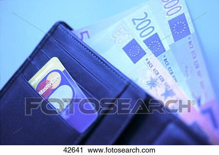 Wallet with credit card and paper currency View Large Photo Image Stock Image - Wallet with credit card and paper currency . Fotosearch