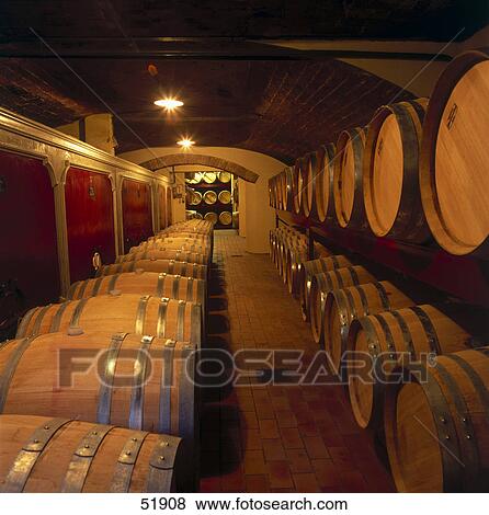 Stock Photo - Wine barrels in cellar, Piemont, Italy . Fotosearch