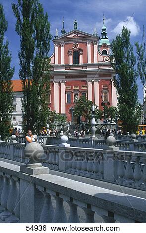 Stock Photograph - Woman on bridge, Ljubljana, Slovenia . Fotosearch