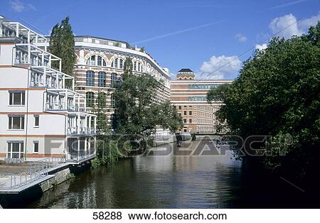 Stock Photo - Apartments at waterfront, Karl-Heine-Kanal, Leipzig, Saxony, Germany . Fotosearch