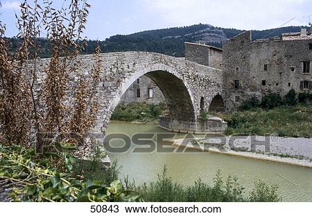 Bridge across river, Lagrasse, Orbieu River, France View Large Photo Image Stock Image - Bridge across river, Lagrasse, Orbieu River, France . Fotosearch