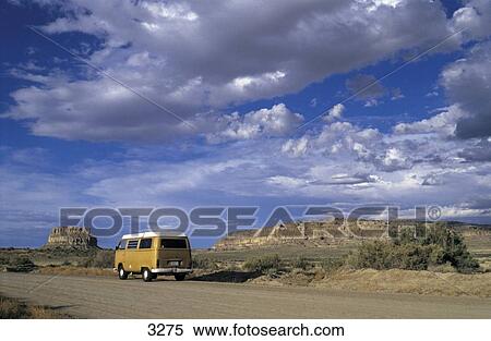 Camper van moving on dirt road, New Mexico, USA View Large Photo Image Stock Photography - Camper van moving on dirt road, New Mexico, USA . Fotosearch