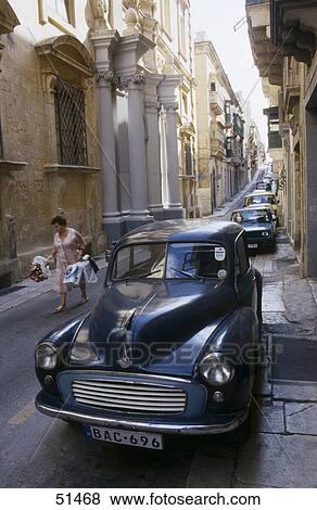 Cars in front of houses, Valetta, Malta View Large Photo Image Stock Photo - Cars in front of houses, Valetta, Malta . Fotosearch