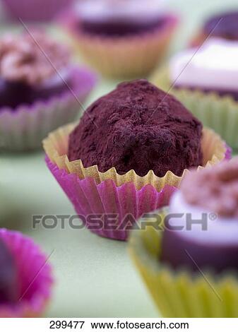 Close-up of balls of chocolates View Large Photo Image Stock Photo - Close-up of balls of chocolates . Fotosearch