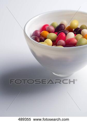 Close-up of colored candies in bowl View Large Photo Image Stock Photography - Close-up of colored candies in bowl . Fotosearch