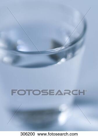 Stock Image - Close-up of glass of water . Fotosearch