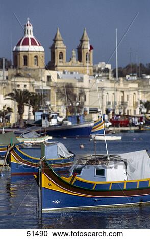 Colored boats in harbor, Marsaxlokk, Malta View Large Photo Image Stock Image - Colored boats in harbor, Marsaxlokk, Malta . Fotosearch