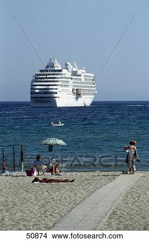 Cruise ship moored near beach, Giardini Naxos, Sicily, Italy  View Large Photo Image Picture - Cruise ship moored near beach, Giardini Naxos, Sicily, Italy . Fotosearch