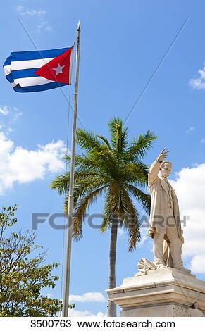 Cuban flag and statue in center of town of Jose Marti, Cienfuegos, Cuba View Large Photo Image Stock Image - Cuban flag and statue in center of town of Jose Marti, Cienfuegos, Cuba . Fotosearch