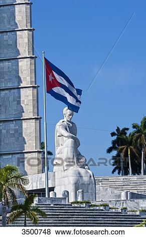 Cuban flag and statue in center of town of Jose Marti, Havana, Cuba View Large Photo Image Stock Photo - Cuban flag and statue in center of town of Jose Marti, Havana, Cuba . Fotosearch