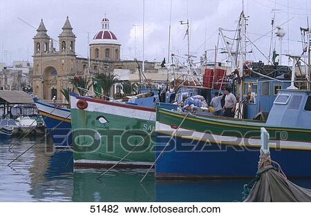 Fishing boats at harbor, Marsaxlokk, Malta View Large Photo Image Stock Image - Fishing boats at harbor, Marsaxlokk, Malta . Fotosearch