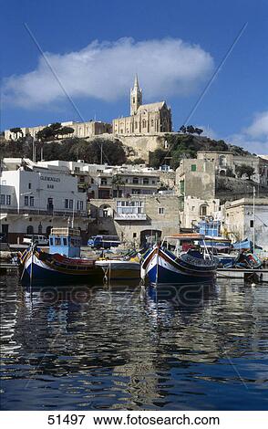 Fishing boats in harbor, Mgarr, Gozo, Malta View Large Photo Image Stock Photo - Fishing boats in harbor, Mgarr, Gozo, Malta . Fotosearch
