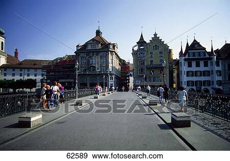 Stock Photo - Group of people on sidewalk, Luzern, Switzerland, Europe . Fotosearch
