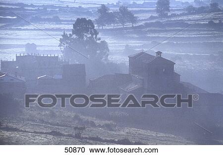 High angle view of monastery surrounded by fog, Santillana del Mar, Cantabria, Spain View Large Photo Image Stock Image - High angle view of monastery surrounded by fog, Santillana del Mar, Cantabria, Spain . Fotosearch