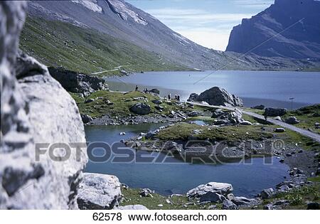 High angle view of rocks and lake, Kandersteg, Switzerland, Europe View Large Photo Image Stock Photo - High angle view of rocks and lake, Kandersteg, Switzerland, Europe . Fotosearch