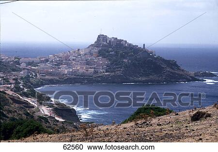 Stock Image - High angle view of town on coast, Lanusei, Sardinia, Italy, Europe . Fotosearch