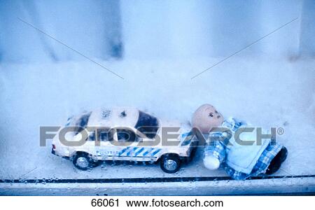 High angle view of toy car and doll View Large Photo Image Stock Image - High angle view of toy car and doll . Fotosearch