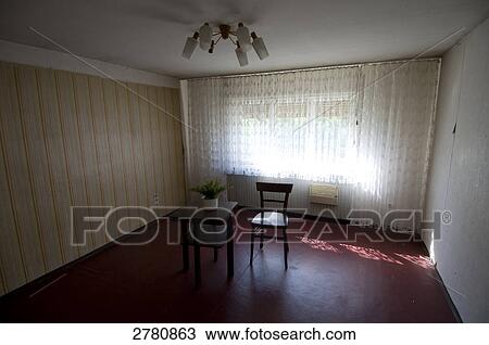 Houseplant on table with chair in room View Large Photo Image Stock Image - Houseplant on table with chair in room . Fotosearch