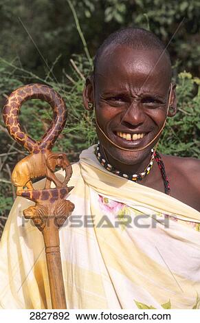 Massai with stick, Kenya View Large Photo Image Stock Image - Massai with stick, Kenya . Fotosearch