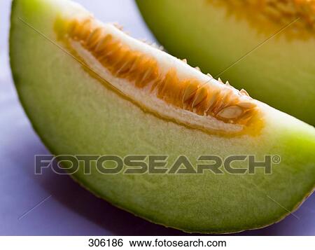 Stock Photograph - melon slices, close-up . Fotosearch