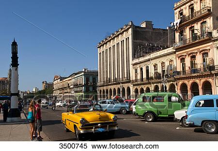 Old Classic American cars in main central street, Havana, Cuba View Large Photo Image Stock Photography - Old Classic American cars in main central street, Havana, Cuba . Fotosearch
