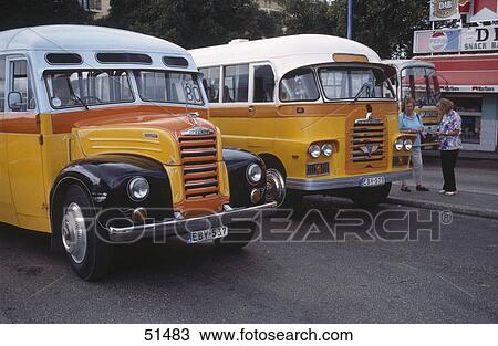 Stock Image - Passengers at bus stop, Valetta, Malta . Fotosearch
