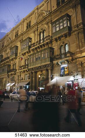 People in street at dusk, Valletta, Malta View Large Photo Image Stock Image - People in street at dusk, Valletta, Malta . Fotosearch