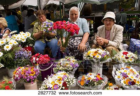 Stock Image - People on the market of Lviv, Ukraine . Fotosearch