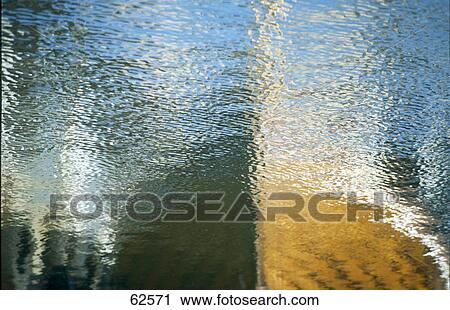 Reflection of wooden boat hull in water View Large Photo Image Stock Image - Reflection of wooden boat hull in water . Fotosearch