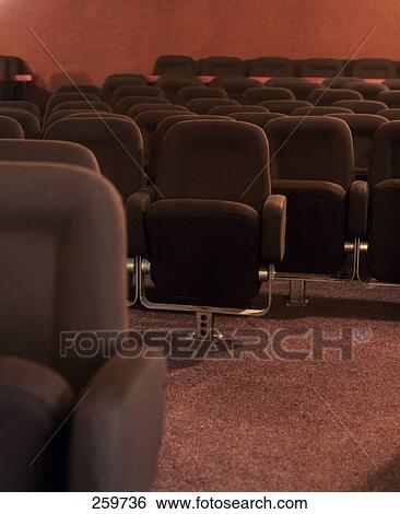 Rows of empty cinema seats View Large Photo Image Stock Photograph - Rows of empty cinema seats . Fotosearch