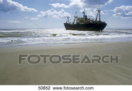 Stock Image - Ship moored at beach, Gruissan, France . Fotosearch