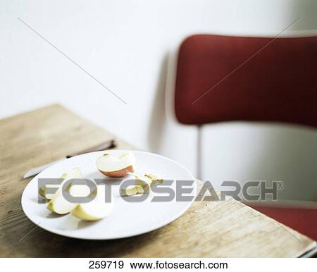Slices of apple on plate View Large Photo Image Stock Photo - Slices of apple on plate . Fotosearch