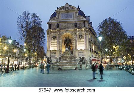 Stock Photo - Tourists at in front of building, Paris, France . Fotosearch