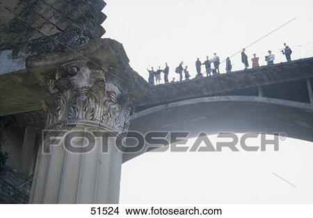 Tourists on bridge, Herculaneum, Ercolano, Italy View Large Photo Image Picture - Tourists on bridge, Herculaneum, Ercolano, Italy . Fotosearch