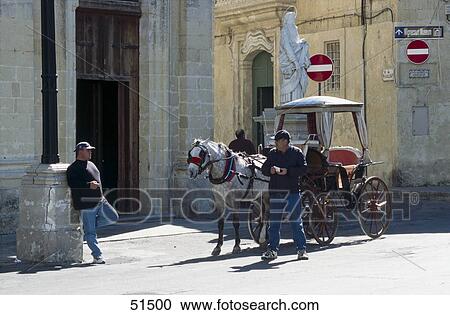 Two coachmen waiting near carriage, Rabat, Malta View Large Photo Image Stock Image - Two coachmen waiting near carriage, Rabat, Malta . Fotosearch