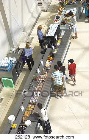 Aerial view of tourists at exhibition, London, England View Large Photo Image Stock Photo - Aerial view of tourists at exhibition, London, England . Fotosearch