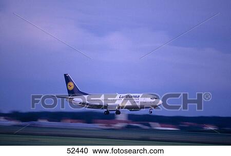 Airplane landing on runway View Large Photo Image Stock Image - Airplane landing on runway . Fotosearch