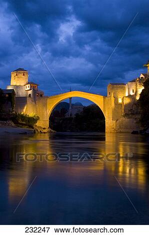 Arch bridge at dusk, Stari Most, Neretva, Bosnia And Hercegovina View Large Photo Image Stock Photo - Arch bridge at dusk, Stari Most, Neretva, Bosnia And Hercegovina . Fotosearch